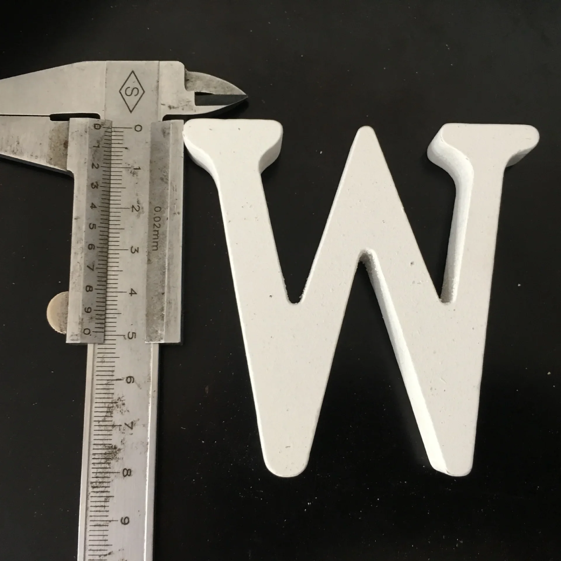 W