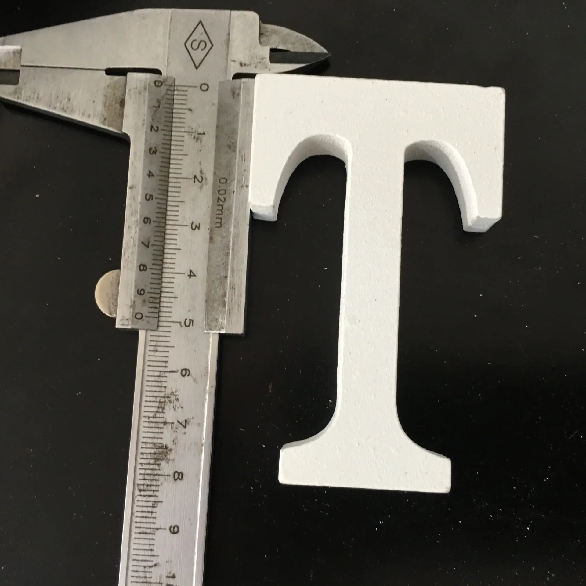 T