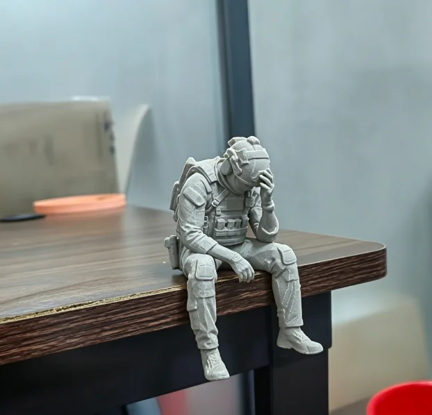 grey Sitting Soldier